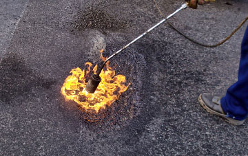 Hillside flat roofing repairs